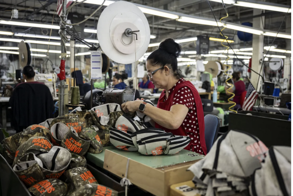 Unionwear worker making Harris Walz hats